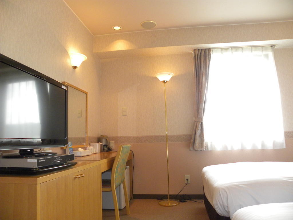 Hotel Benex Йонезава Стая снимка