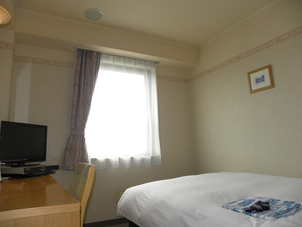 Hotel Benex Йонезава Стая снимка